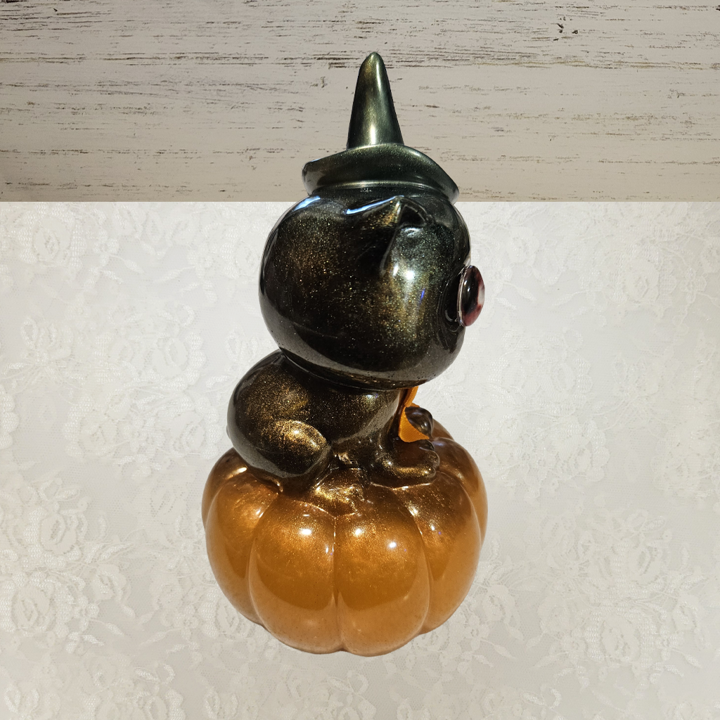 Cat With Witches Hat Sitting On Pumpkin