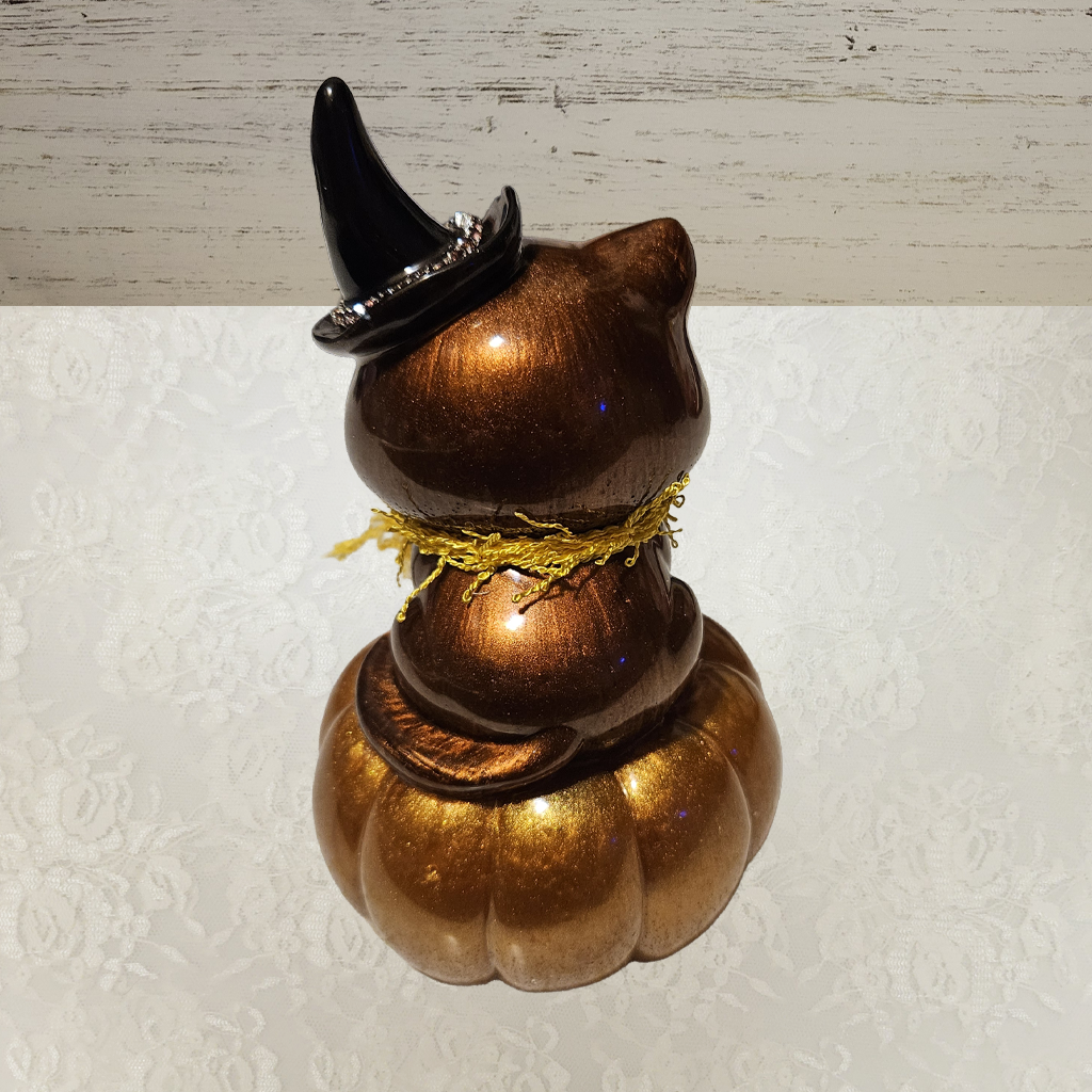Cat With Witches Hat Sitting On Pumpkin