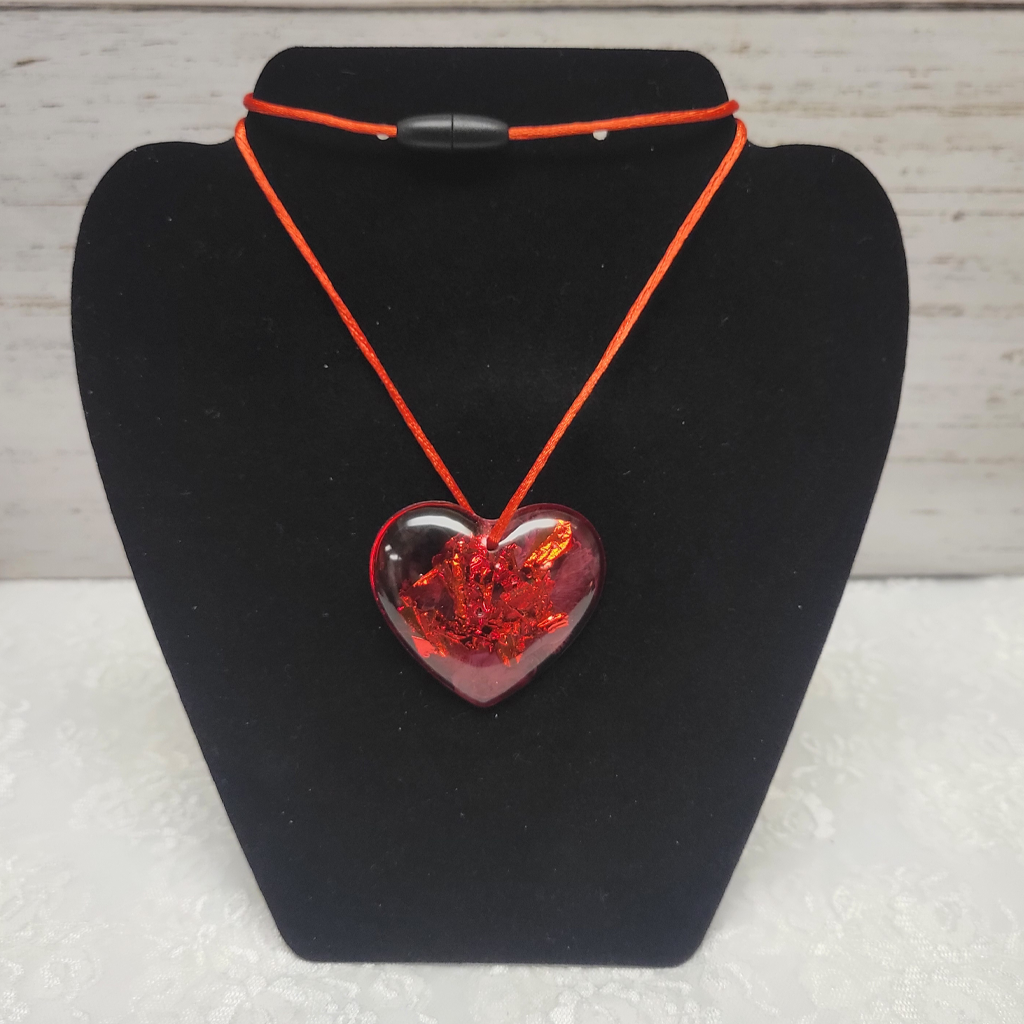A Valentine Heart Necklace With Red Silk Cord