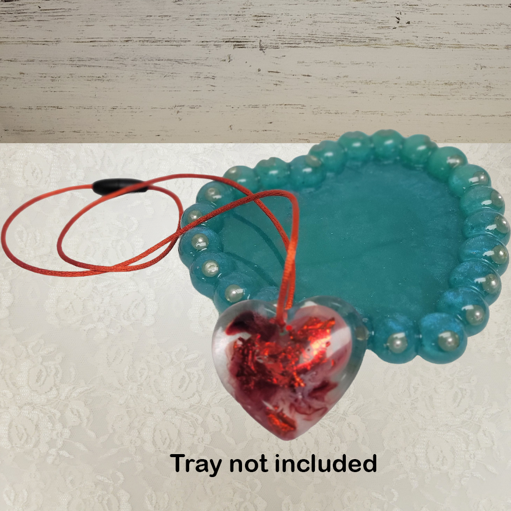 A Valentine Heart Necklace With Red Silk Cord