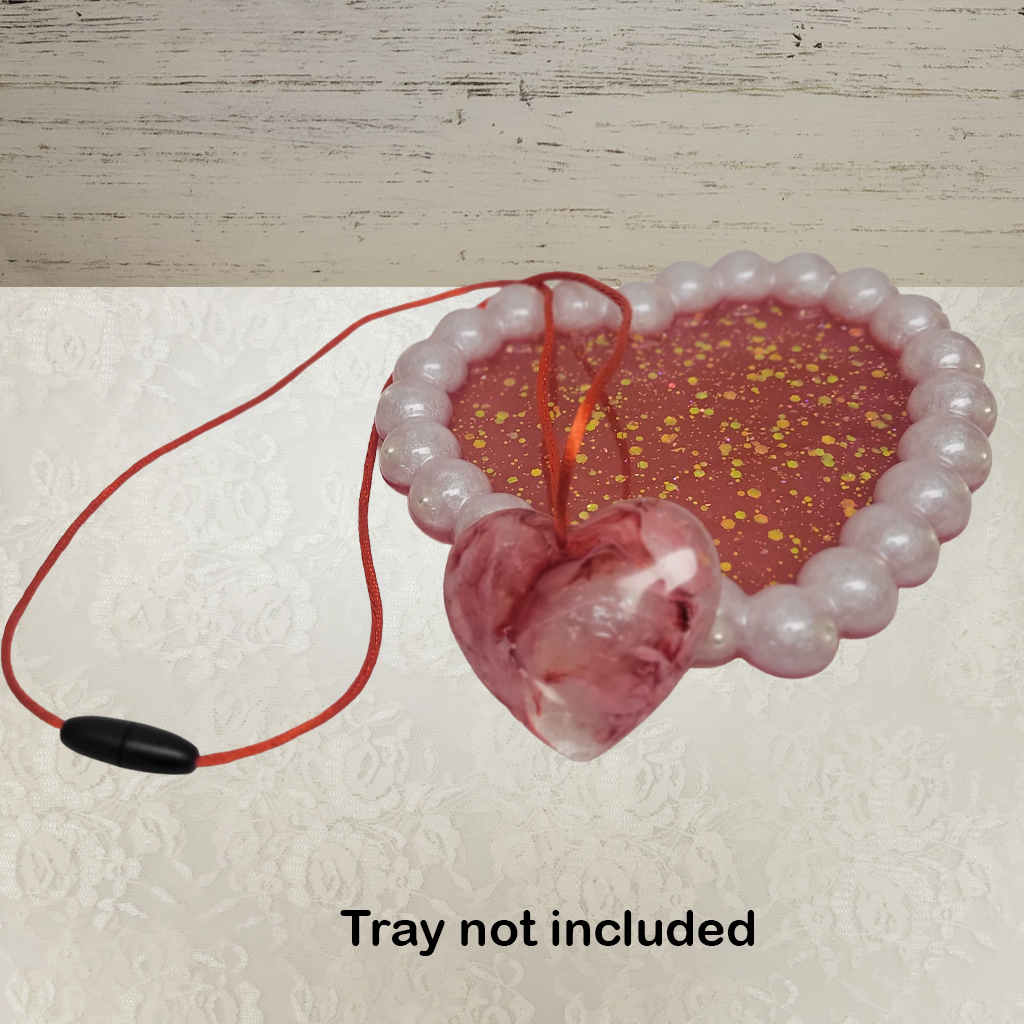 A Valentine Heart Necklace With Red Silk Cord