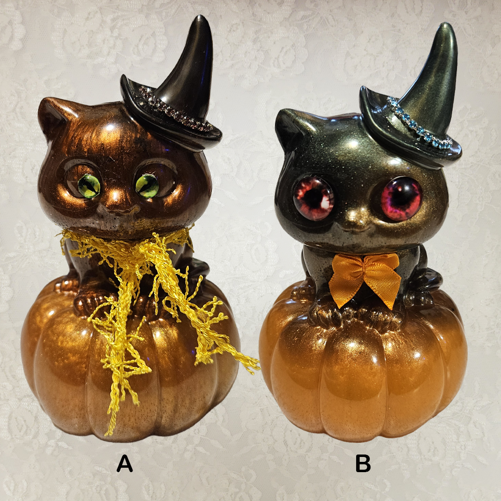Cat With Witches Hat Sitting On Pumpkin